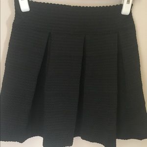 Black pleated skirt